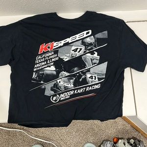 Adult large black racing shirt. Fits like a large true to size.
